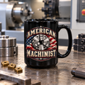 American Machinist black 15 oz mug on a machinist workbench with CNMG turning inserts